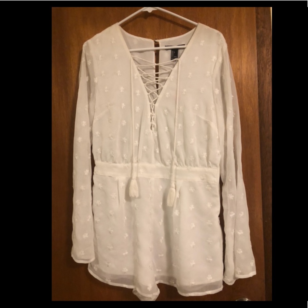 SOLD White long sleeve romper. Brand new.